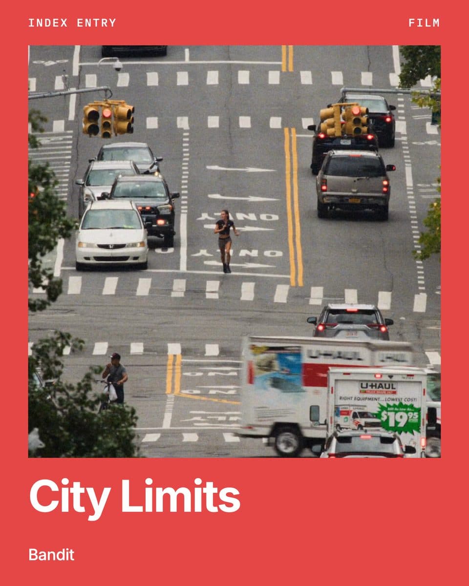 The Index Entry plate for City Limits by Bandit: a red frame around a runner on a New York avenue